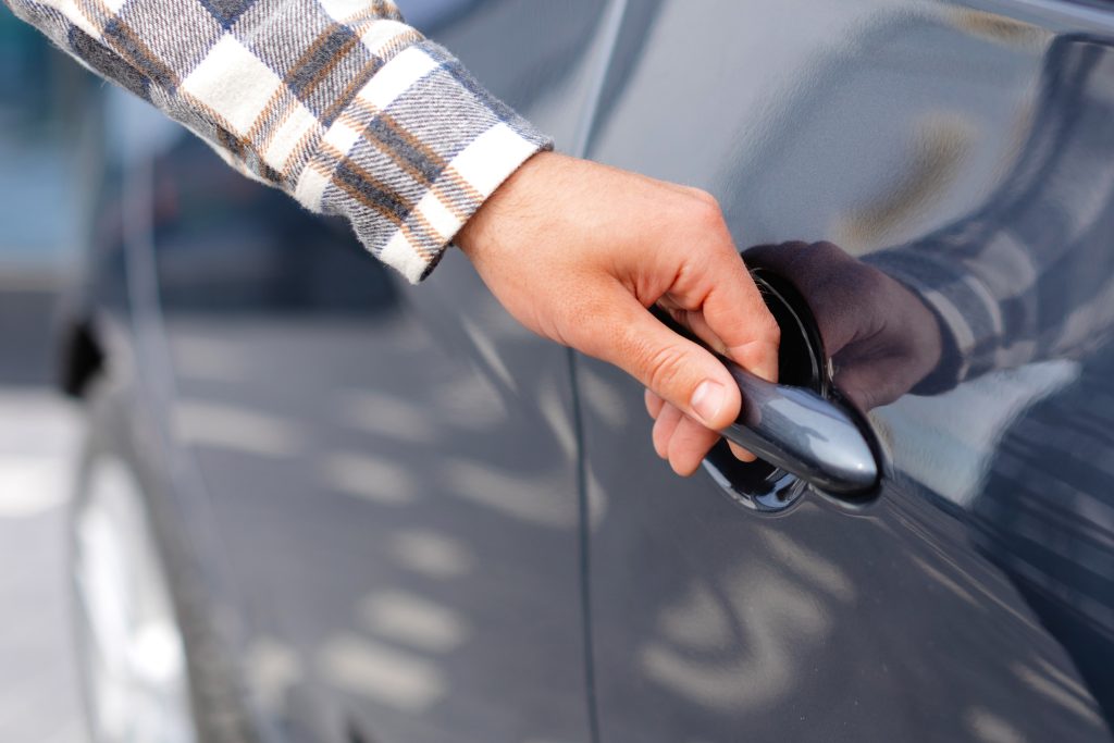 young man buying auto at dealership salon and open 2026 01 08 23 01 08 utc